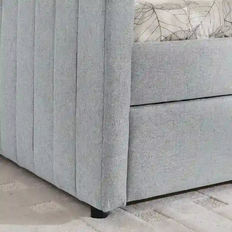 Graues Polster-Tagesbett mit Ausziehbett