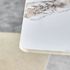 Mesa de comedor de piedra sinterizada blanca con patas color plateado