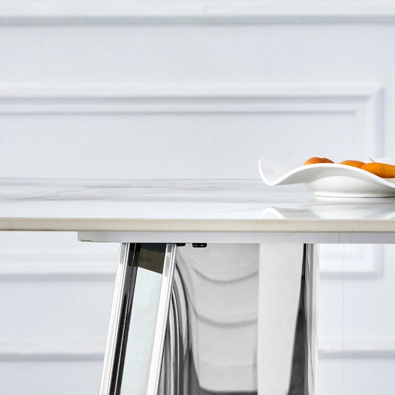 Mesa de comedor de piedra sinterizada blanca con patas color plateado
