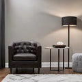 Sillón decorativo tipo barril de piel sintética con capitonado de botones