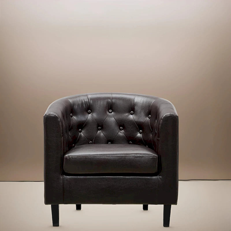 Sillón decorativo tipo barril de piel sintética con capitonado de botones