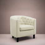 Sillón decorativo tipo barril de piel sintética con capitonado de botones