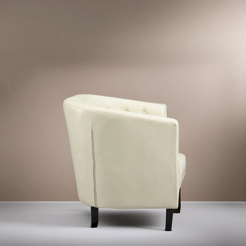 Sillón decorativo tipo barril de piel sintética con capitonado de botones