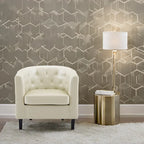 Sillón decorativo tipo barril de piel sintética con capitonado de botones