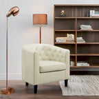 Sillón decorativo tipo barril de piel sintética con capitonado de botones