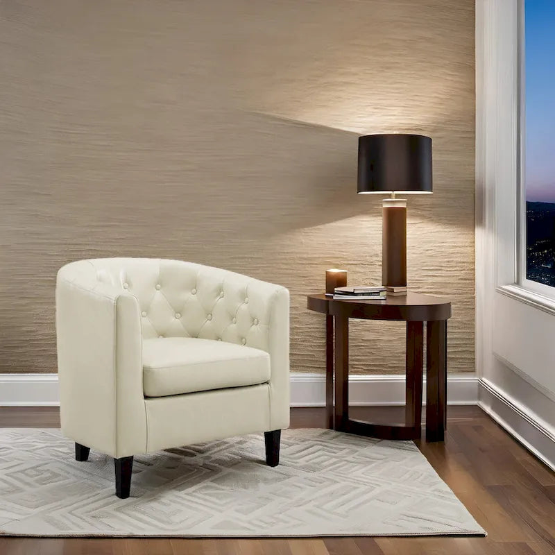 Sillón decorativo tipo barril de piel sintética con capitonado de botones