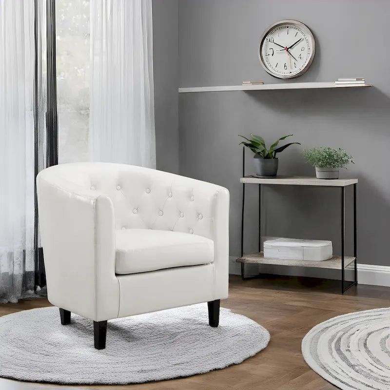 Sillón decorativo tipo barril de piel sintética con capitonado de botones