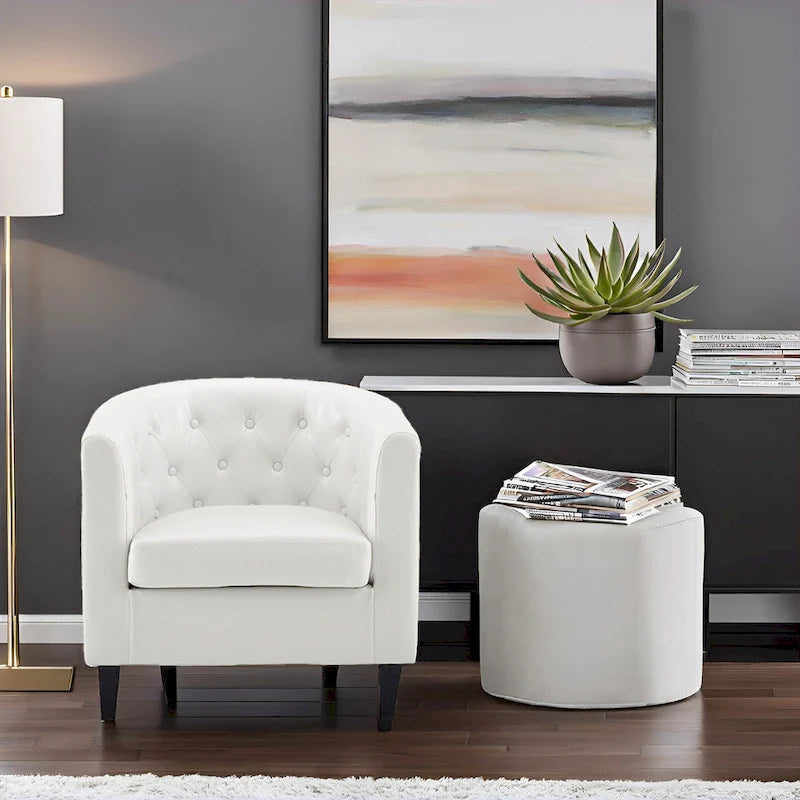 Sillón decorativo tipo barril de piel sintética con capitonado de botones