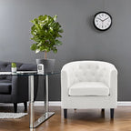 Sillón decorativo tipo barril de piel sintética con capitonado de botones