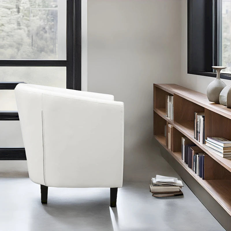Sillón decorativo tipo barril de piel sintética con capitonado de botones