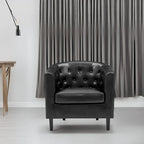 Sillón decorativo tipo barril de piel sintética con capitonado de botones