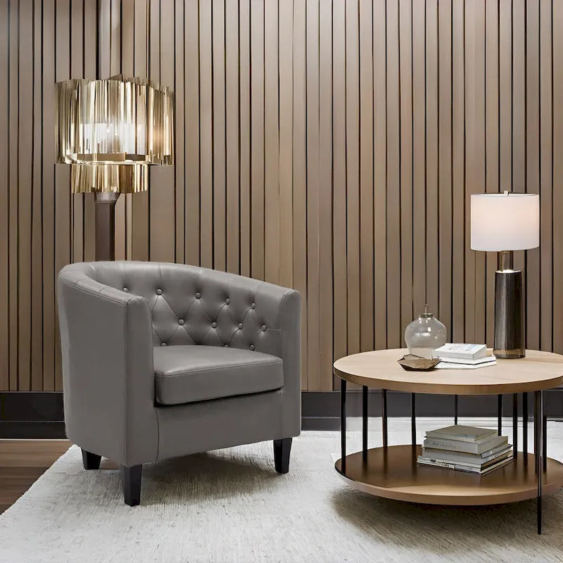 Sillón decorativo tipo barril de piel sintética con capitonado de botones