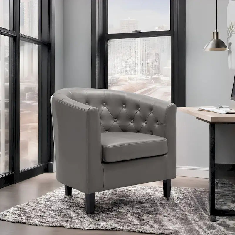 Sillón decorativo tipo barril de piel sintética con capitonado de botones