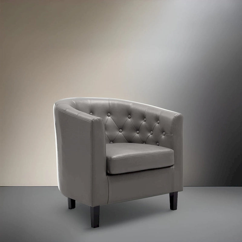 Sillón decorativo tipo barril de piel sintética con capitonado de botones
