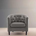 Sillón decorativo tipo barril de piel sintética con capitonado de botones
