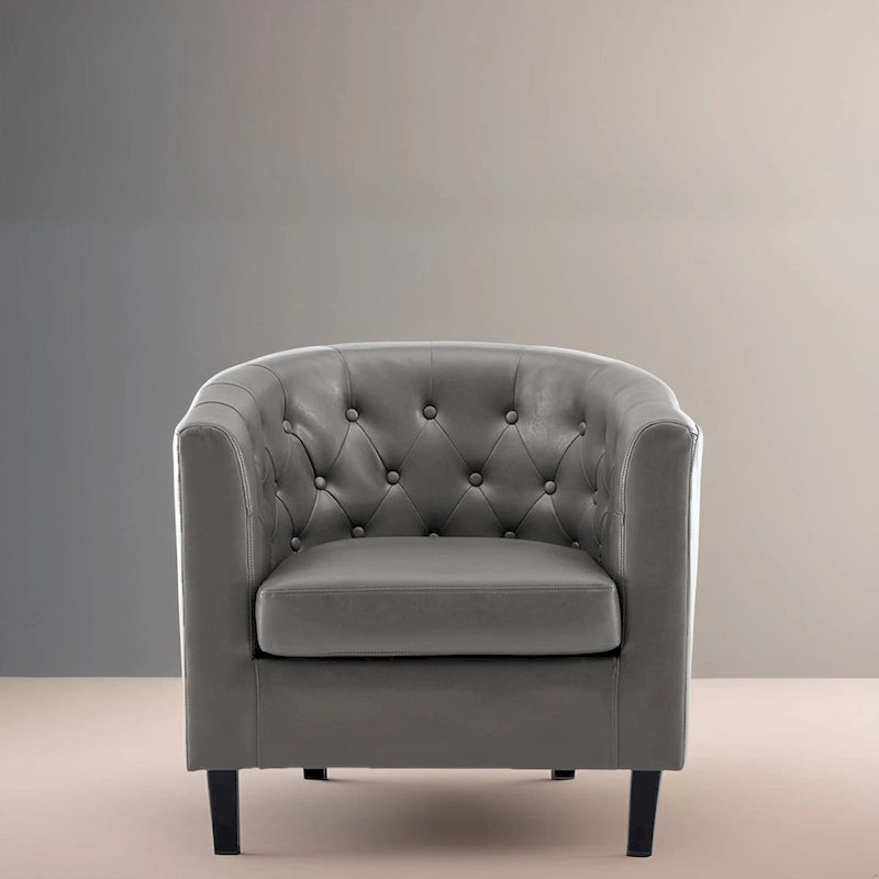 Sillón decorativo tipo barril de piel sintética con capitonado de botones