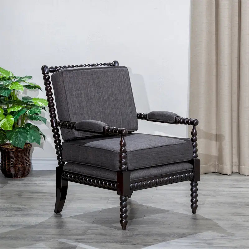 Poltrona in tessuto con struttura in legno