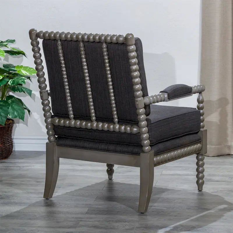 Poltrona in tessuto con struttura in legno