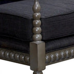 Poltrona in tessuto con struttura in legno