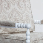 Poltrona in tessuto con struttura in legno
