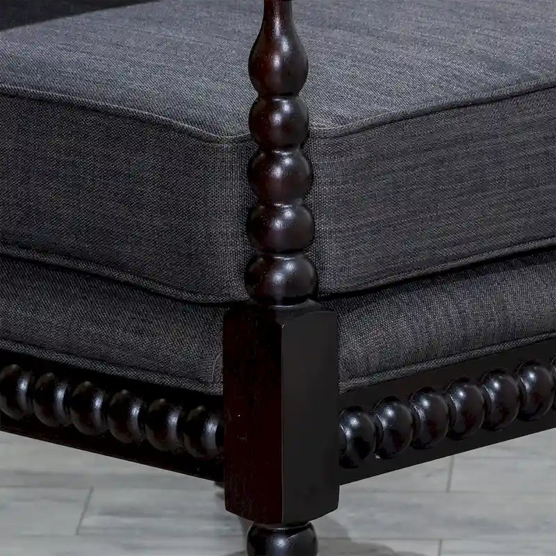 Poltrona in tessuto con struttura in legno