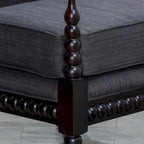 Poltrona in tessuto con struttura in legno
