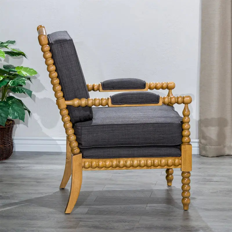 Poltrona in tessuto con struttura in legno