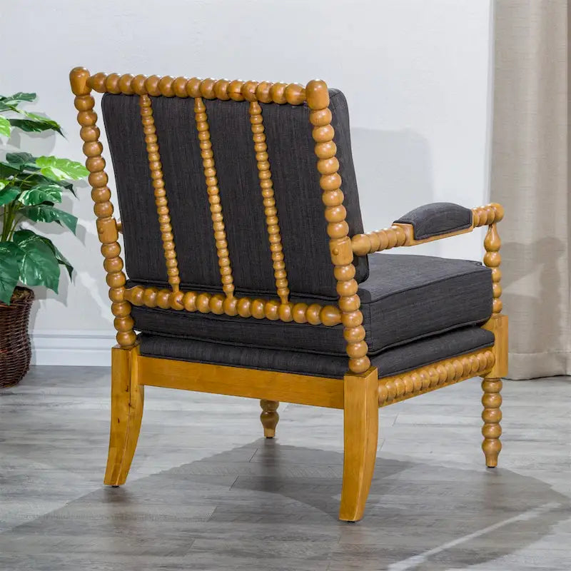 Poltrona in tessuto con struttura in legno