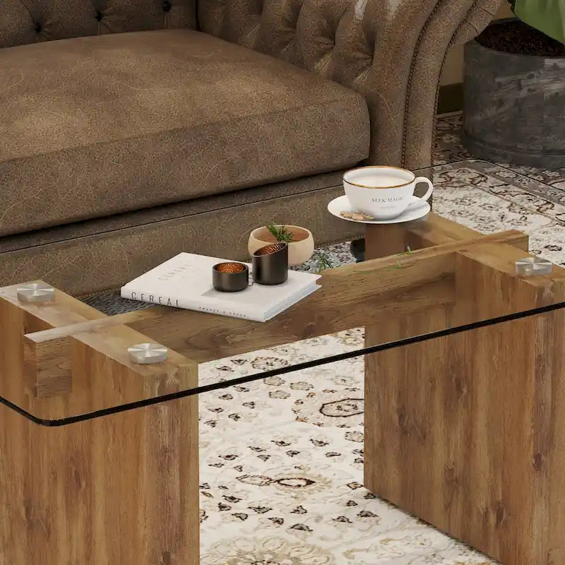 Tavolino da caffè con piano in vetro e supporti in MDF