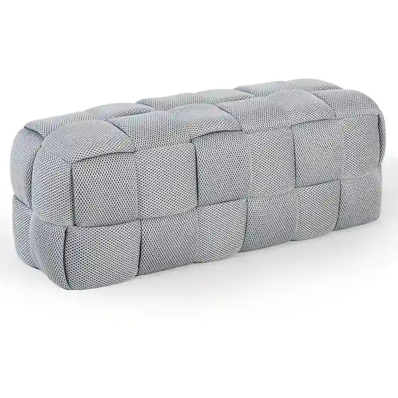 Grauer quadratischer gepolsterter Hocker